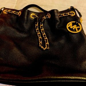 Michael Kors black leather drawstring bag